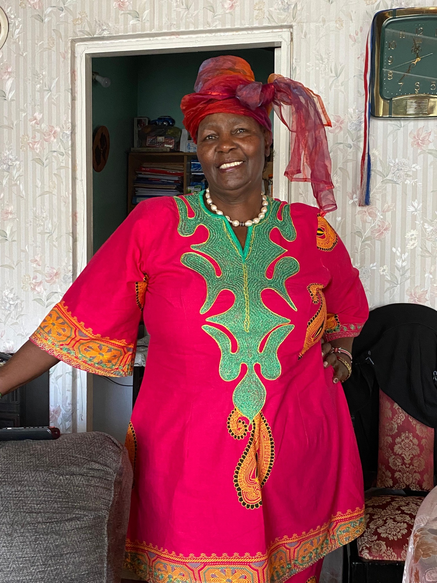 Mama Joy in vibrant traditional Kenyan dress